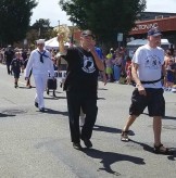 Glenn Ledbetter blows kiss to daughter at Edmonds Independence Day Parade, 2017